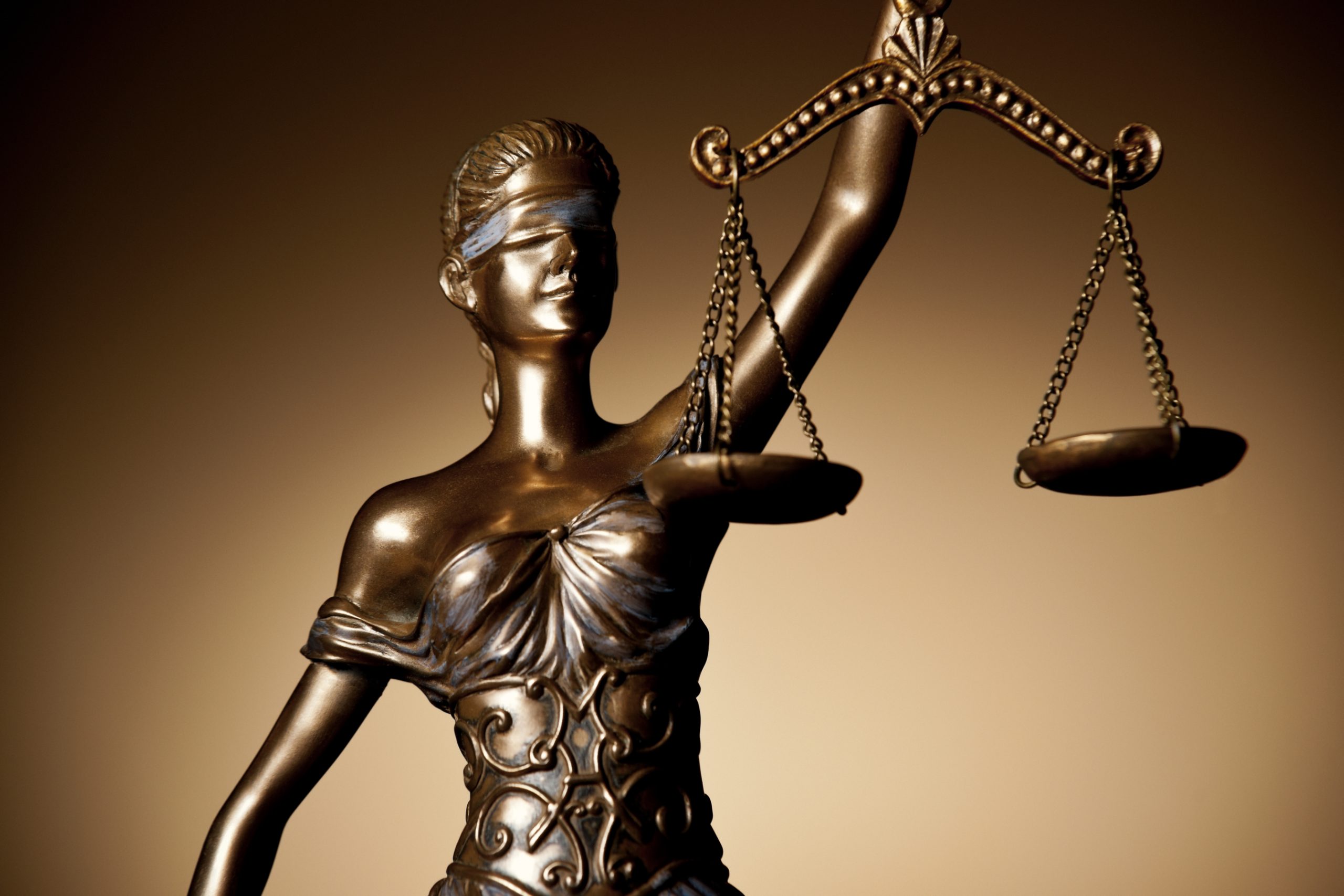photo of a statue of Lady Justice